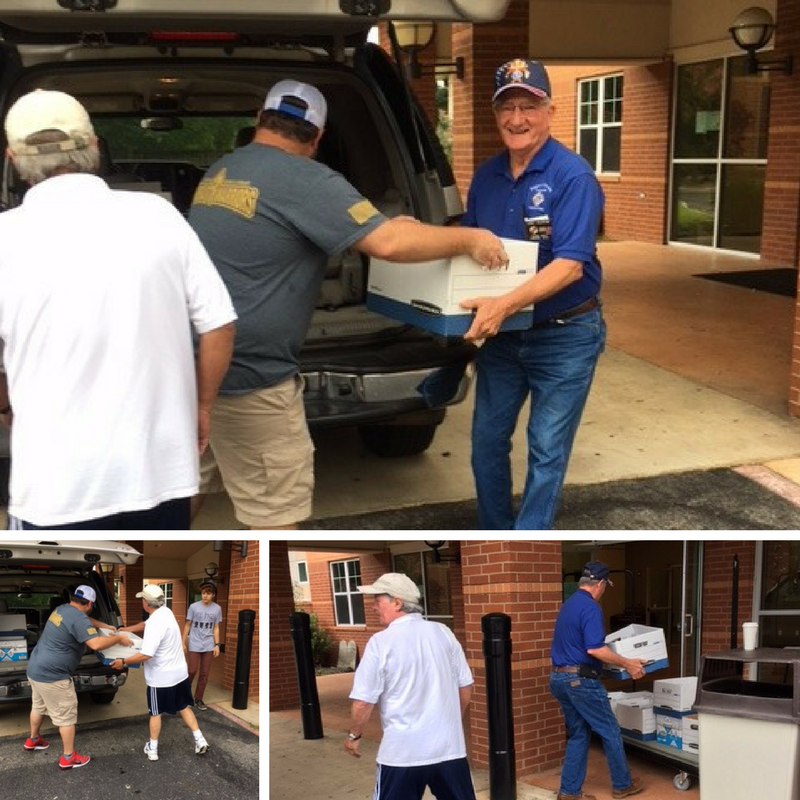 The Sloan Firm donates bottled water to help Hurricane Harvey victims.