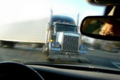 Do i sue the truck company or driver?